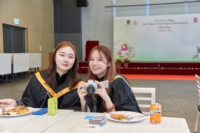 Ms YUAN Shuai (right) and her roommate Ms WANG Yujiao Jennie at CWC Photo Day buffet lunch